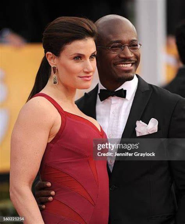 Actress Idina Menzel and actor John Travolta speak onstage during the 87th Annual Academy Awards at Dolby Theatre on February 22, 2015 in Hollywood...