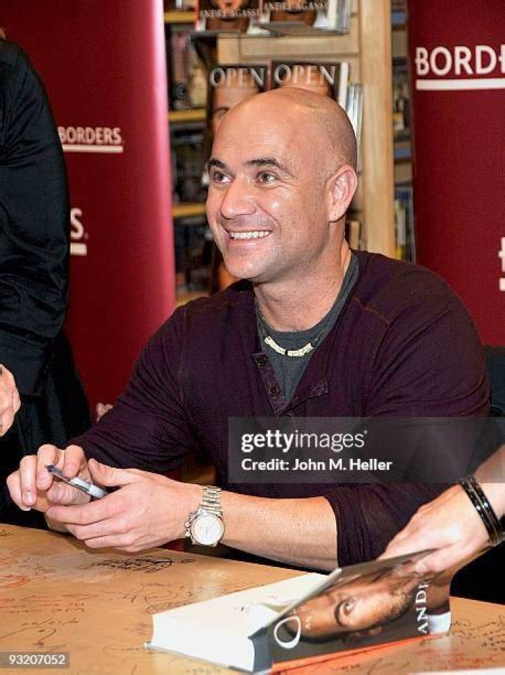Andre Agassi Signs Copies Of His Autobiography, Open