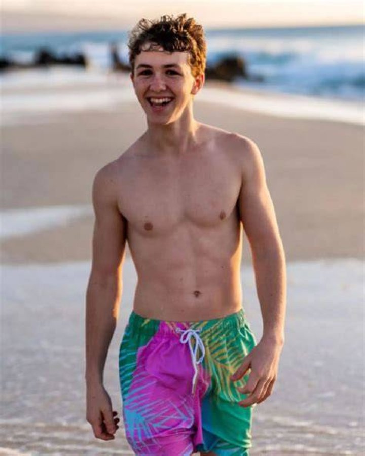 Ethan Wacker posing for the photo showing his sixpacks