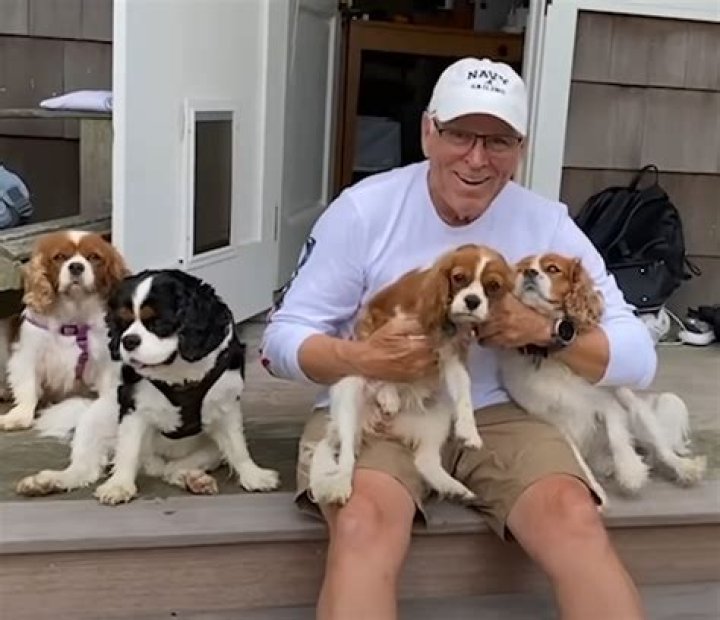 Jimmy Buffett making his dogs dinner