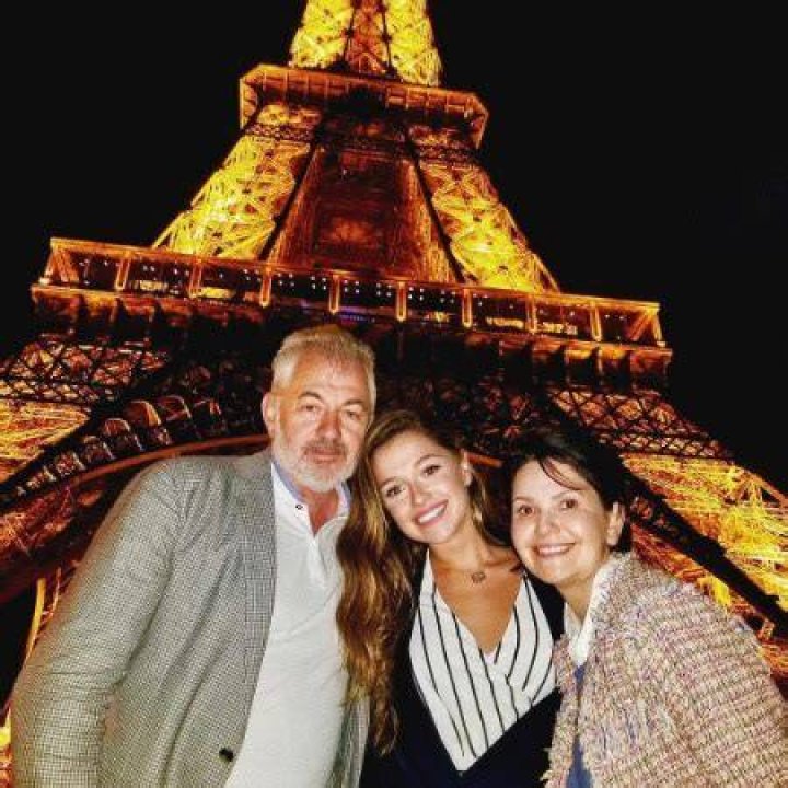 Julia Tsirkin with her father Vladimir Tsirkin and mother Tanyusha Tsirkin in front of Eifel Tower.