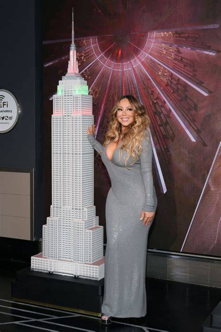 Mariah Carey lights the Empire State Building in celebration of the 25th anniversary of "All I Want For Christmas Is You" at the Empire State Build...
