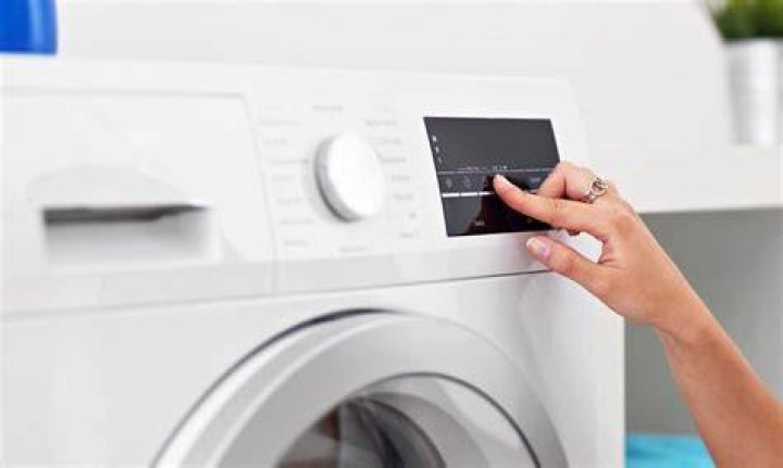 Why does my GE washer keep pausing?